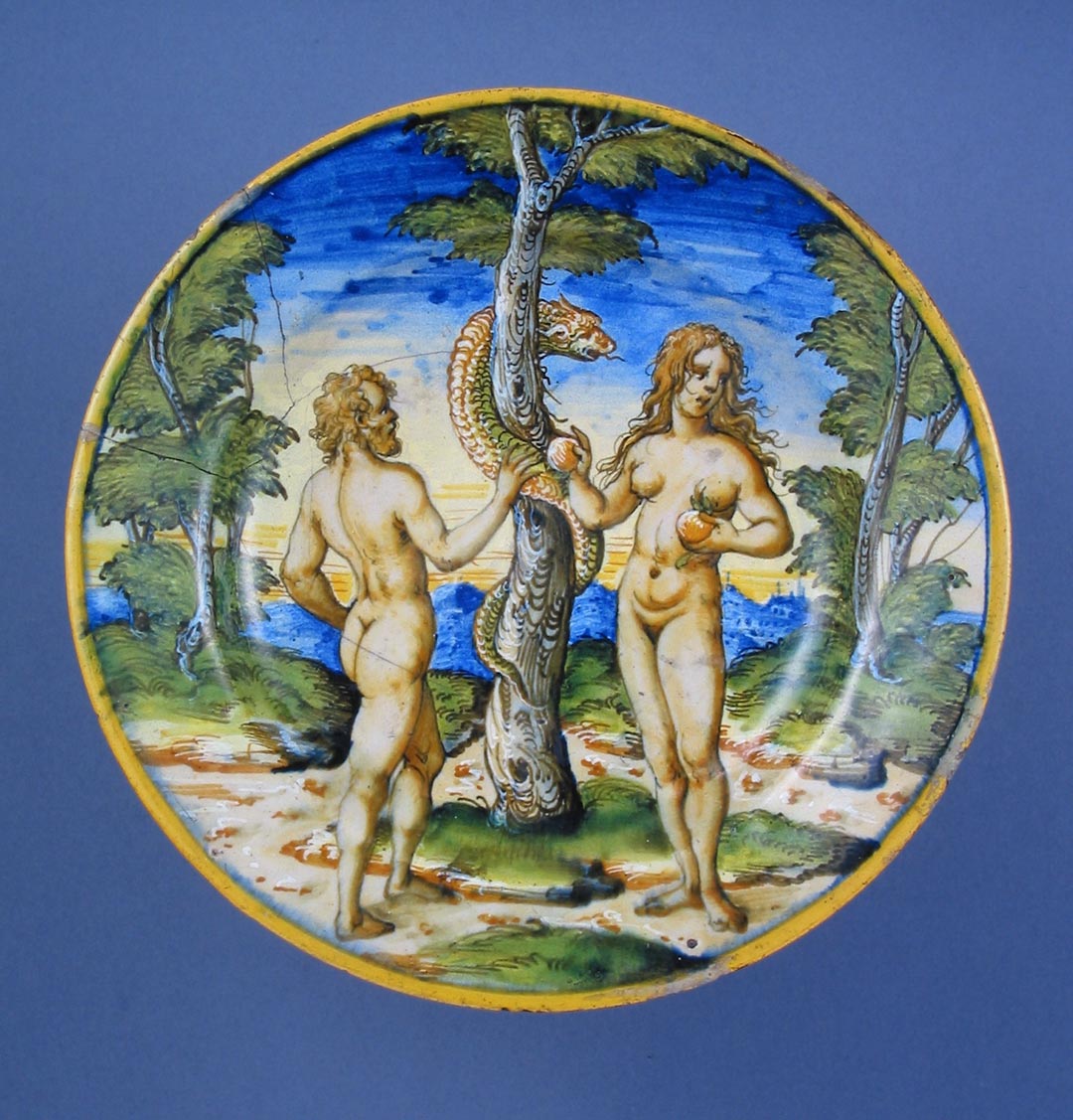 Plate depicting Eve giving the forbidden apple to Adam. Tin glazed earthenware, Italy c1550-1600 Courtesy of the Wallace Collection, London ©
